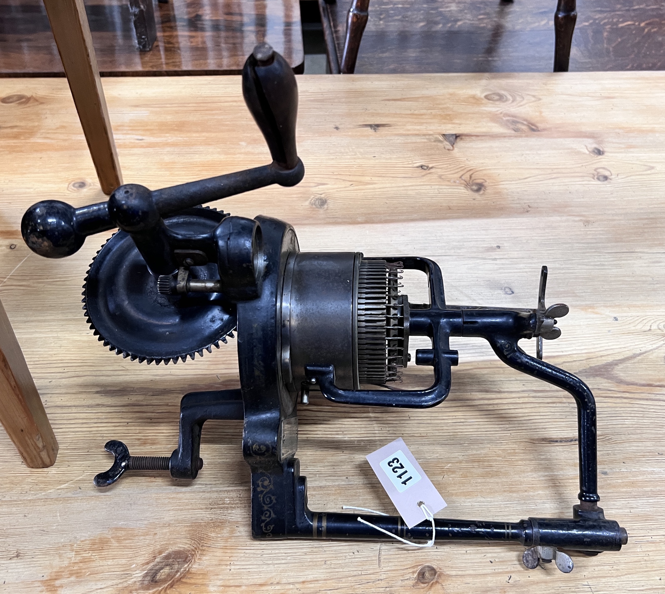 A Victorian patent automatic knitting machine, height 42cm